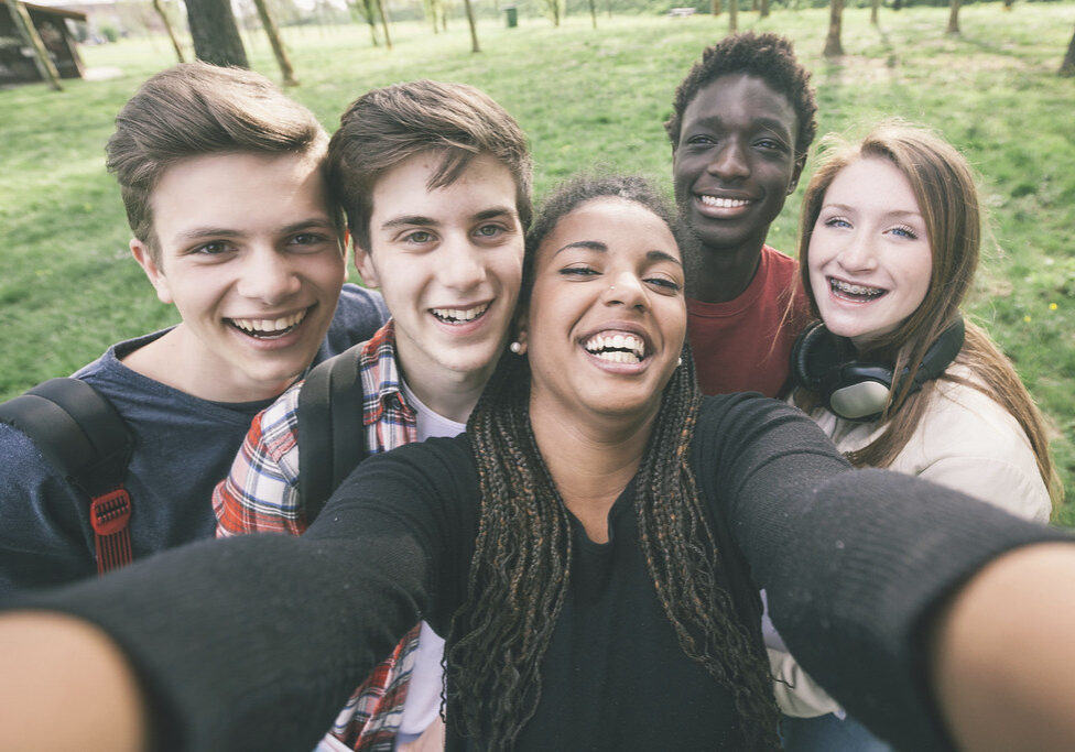 Group of Multiethnic Teenagers Taking a Selfie